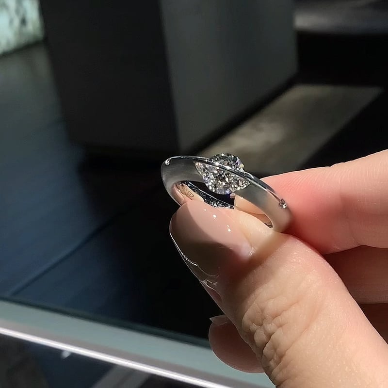 CelestiRing – Rotating Cosmic Diamond Elegance