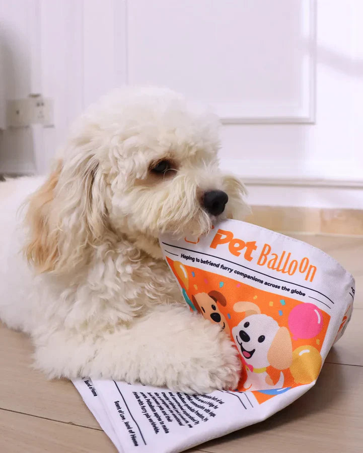 PupChronicle – Interactive Dog Toy