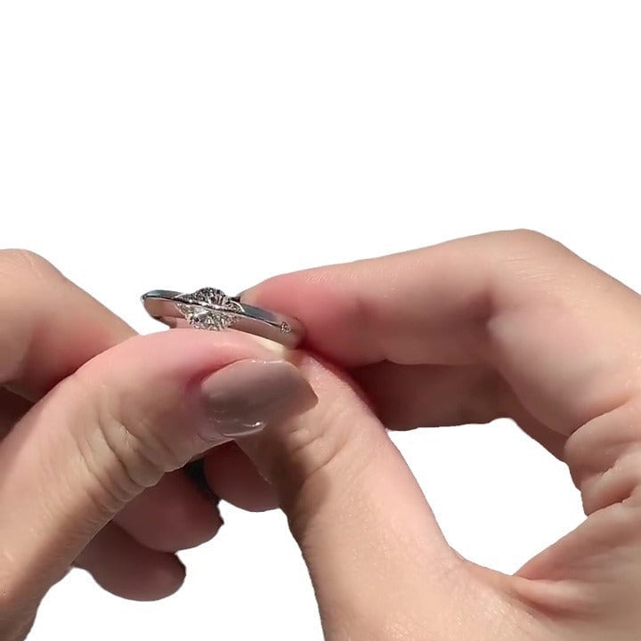 CelestiRing – Rotating Cosmic Diamond Elegance