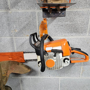 ChainVault – Secure Chainsaw Storage Wall Mount