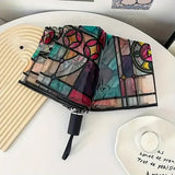 RetroShade – Vintage Stained Auto Umbrella