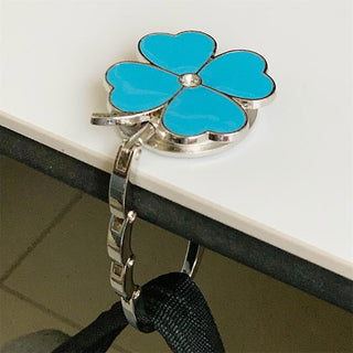 HangElegance - Foldable, Stylish, and Secure Handbag Hanger