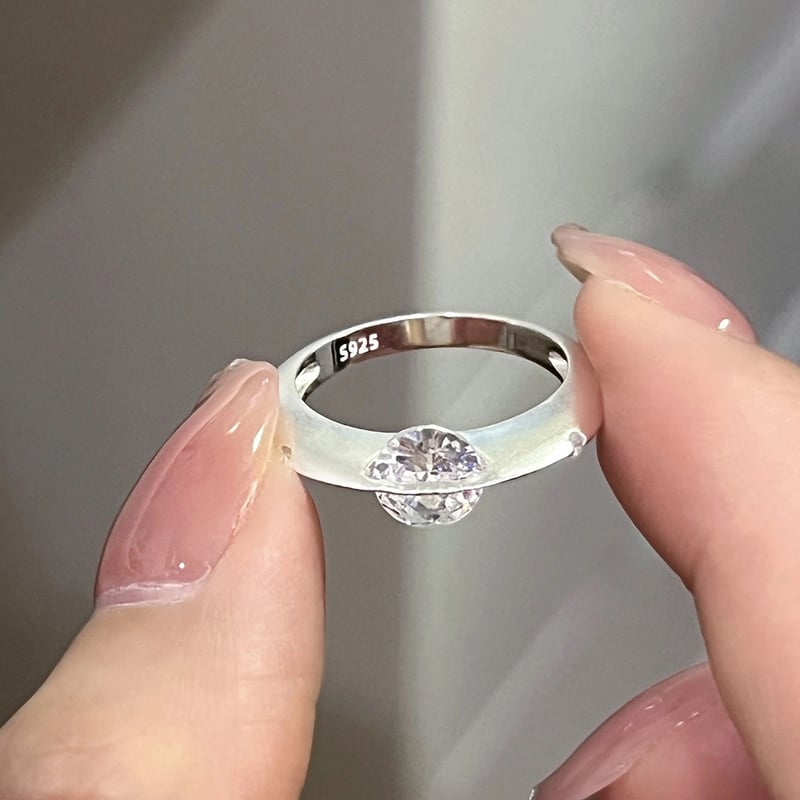 CelestiRing – Rotating Cosmic Diamond Elegance