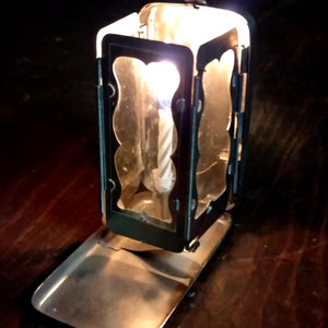 GlowFold – Compact Candle Lantern