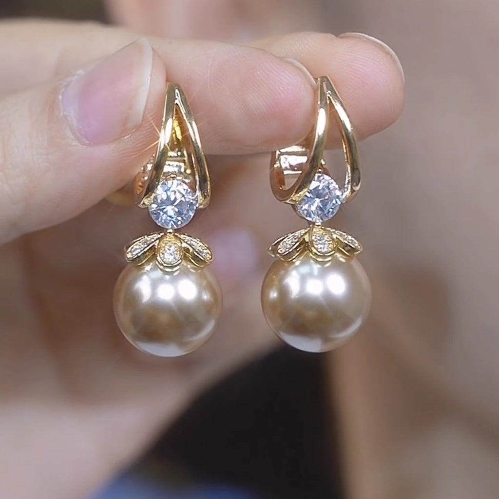 LumiPearl – Sparkling Pearl Huggie Earrings