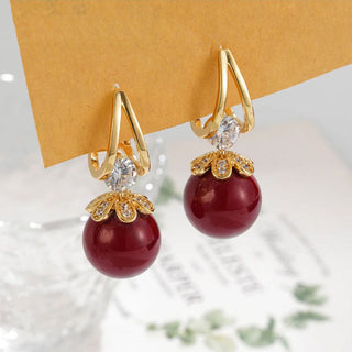 LumiPearl – Sparkling Pearl Huggie Earrings