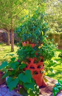 GrowSpin – Rotatable Garden Tower for Vertical Planting