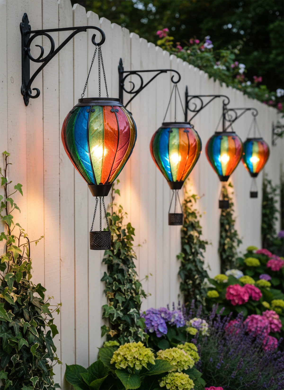Colorful hot air balloon solar lanterns glowing warmly after dark