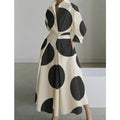 Beige with large black dots