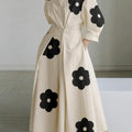 Beige with black flowers
