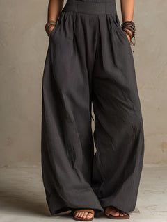 StripeFlow – Crisscross Halter Pinstripe Wide-Leg Jumpsuit