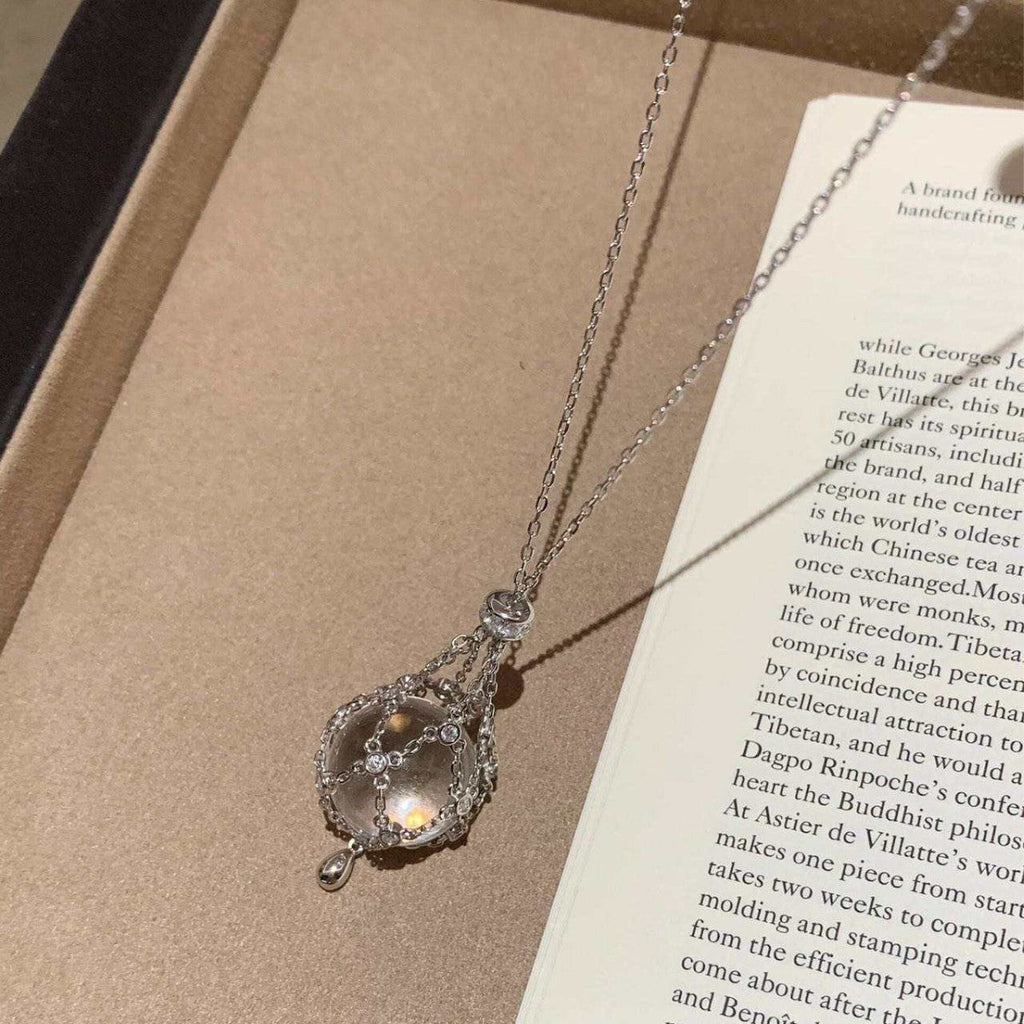 ✨StarGlow – Celestial Crystal Cage Pendant Necklace