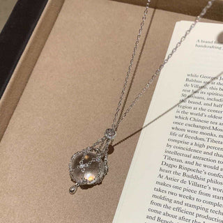 ✨StarGlow – Celestial Crystal Cage Pendant Necklace