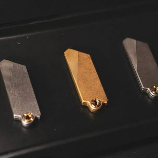 GlideCut – G9 Titanium & Brass Gravity Utility Knife