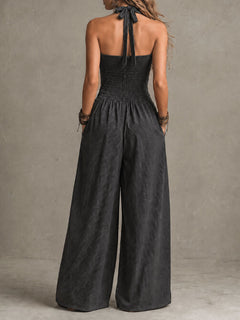 StripeFlow – Crisscross Halter Pinstripe Wide-Leg Jumpsuit