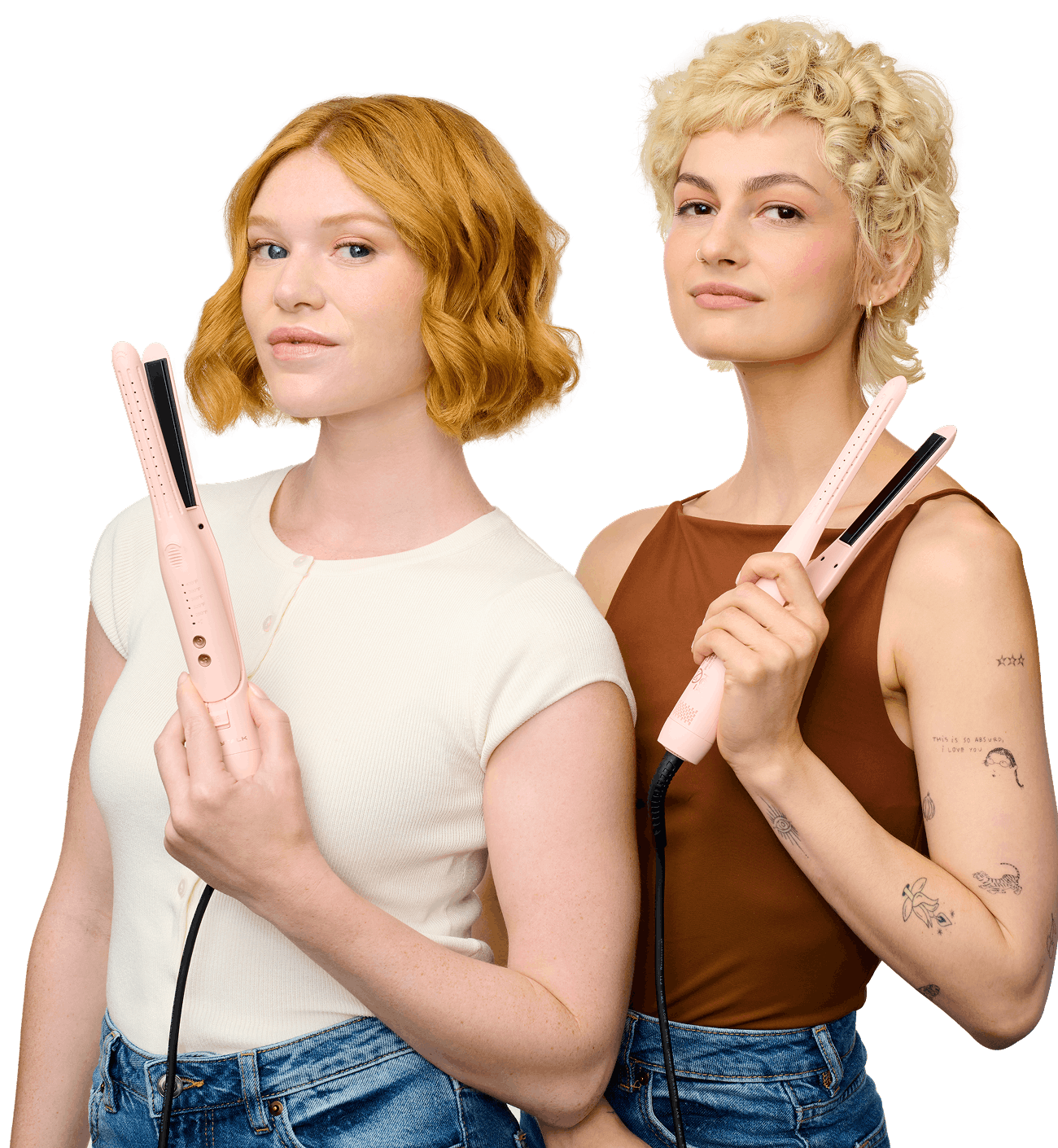 Two women holding pink hair straighteners against a white background