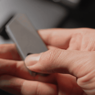GlideCut – G9 Titanium & Brass Gravity Utility Knife