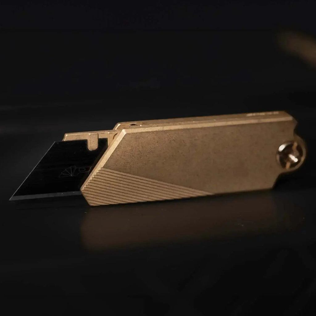 GlideCut – G9 Titanium & Brass Gravity Utility Knife
