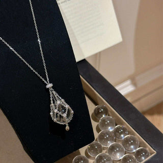 ✨StarGlow – Celestial Crystal Cage Pendant Necklace