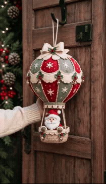 Santa hot air balloon Christmas hanging decoration shown in motion