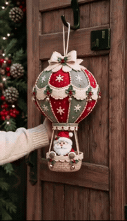 Santa hot air balloon Christmas hanging decoration shown in motion