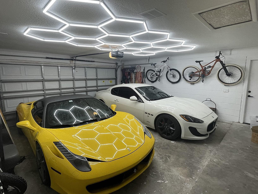 Bright white hexagon LED light covering entire garage space
