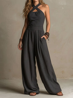 StripeFlow – Crisscross Halter Pinstripe Wide-Leg Jumpsuit