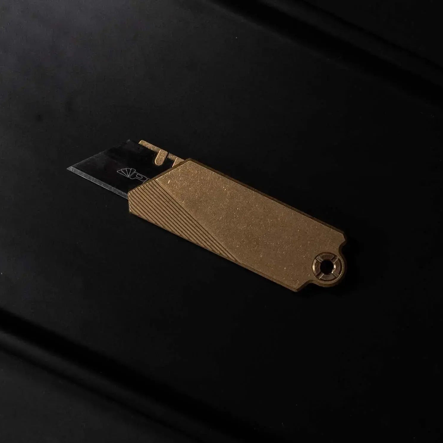 GlideCut – G9 Titanium & Brass Gravity Utility Knife