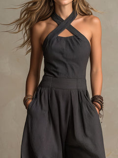 StripeFlow – Crisscross Halter Pinstripe Wide-Leg Jumpsuit