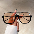 Black Frame + Teal Lenses